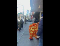 Dragon Dancers Carries Table Inside Establishment  from Outside
