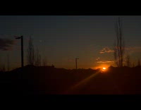 Sunset zoomed and filmed on the horizon