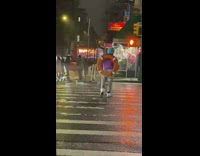 Guy cross street with life ring 