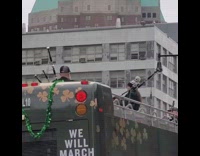 People play bagpipes on double decker bus