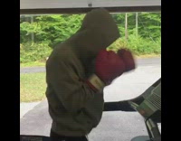 Guy runs fast and practices boxing punches on treadmill, trips and falls off in garage