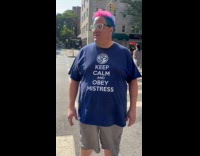 Man wearing obey mistress shirt 