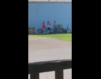 Guy crush drink two beer blue wall