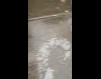 Girl walking on icy floor slips and falls POV