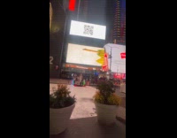 Woman white dress dances selfie ring camera