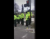 Woman sees very tall man on the street 