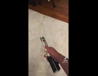 Guy shows lightsaber 