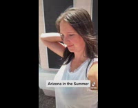 Lady goes outside wet hair instantly dries 