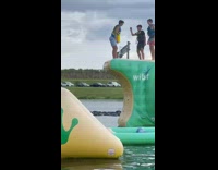 Boy backflips off water obstacle course fails