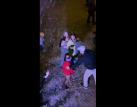 Two girls seflie snow machine grey blanket