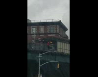 Guy red shirt standing on edge of bridge argument 