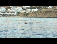 Collab SendItOfficiall - Guy wakeboards on lake water 