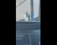 Man yellow chicken costume selfie bucket truck