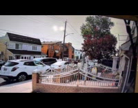 Woman blocks street screams at neighbor house