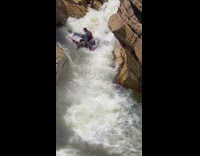 Boat Falls off a Shallow Waters in Rapids