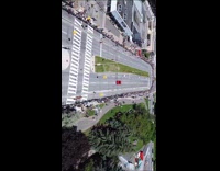 Drone footage of sports car on road