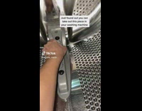 Person opens dirty part of washing machine