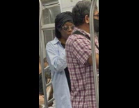 Lady brushes teeth on train 