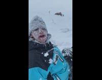 Guy gets stuck rolling down snow