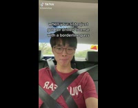 Guy wears multiple seatbelts while sister drives 