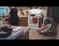 Girl toddler climb swing chair of younger baby 