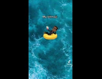 Guy in blue shirt pretending to drop in ocean bitmoji