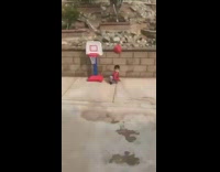 Guy bounces ball against house hits boy 
