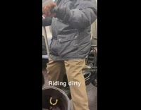Guy on motorcycle in subway 