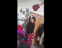 Dog jump to girl shoulder door guitar