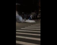 Collab winy - Man dances with smoke effect on road