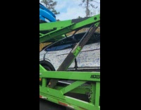 Car covered with signatures transported by truck
