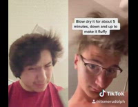 guy follows tiktok hair tutorial red shirt 