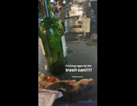 Empty bottles of alcohol and tequila left on public trash can