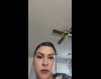 Woman shows middle finger 