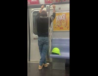 Guy with both middle fingers up subway