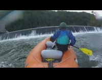 Blue jacket guy orange kayak boat waterfall 