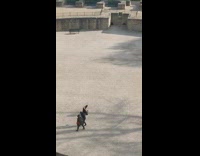 Guy black top interpretative dance  empty park