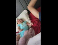 Baby smacks dad when dad rubs hair on sleeping baby