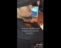 Guy gives girl money to go shop 