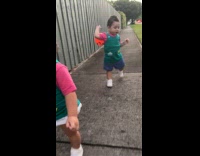 Twins dressed as Phil and Lil from Rugrats