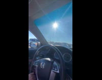 Woman loses phone out of car racing