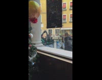 Woman stretches and holds her feet on her back