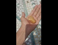 Heart shaped potato held by the filmer