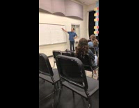 Guy blue shirt white board VSCO girl