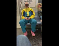 Man blue yellow jacket goggles ride train