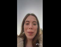 Woman reaction to two pigs crossing road with tiny baby pig