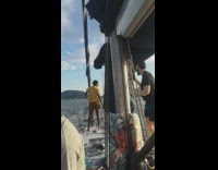 Yellow shirt brown pants sailboat titanic pose 