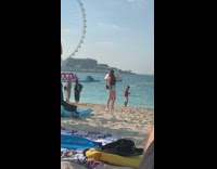 Girl black top selfie beach ferris wheel