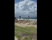 Ocean cliff girl prayer hands yellow bag 