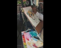 Service dog poses for portrait painting disneyland 